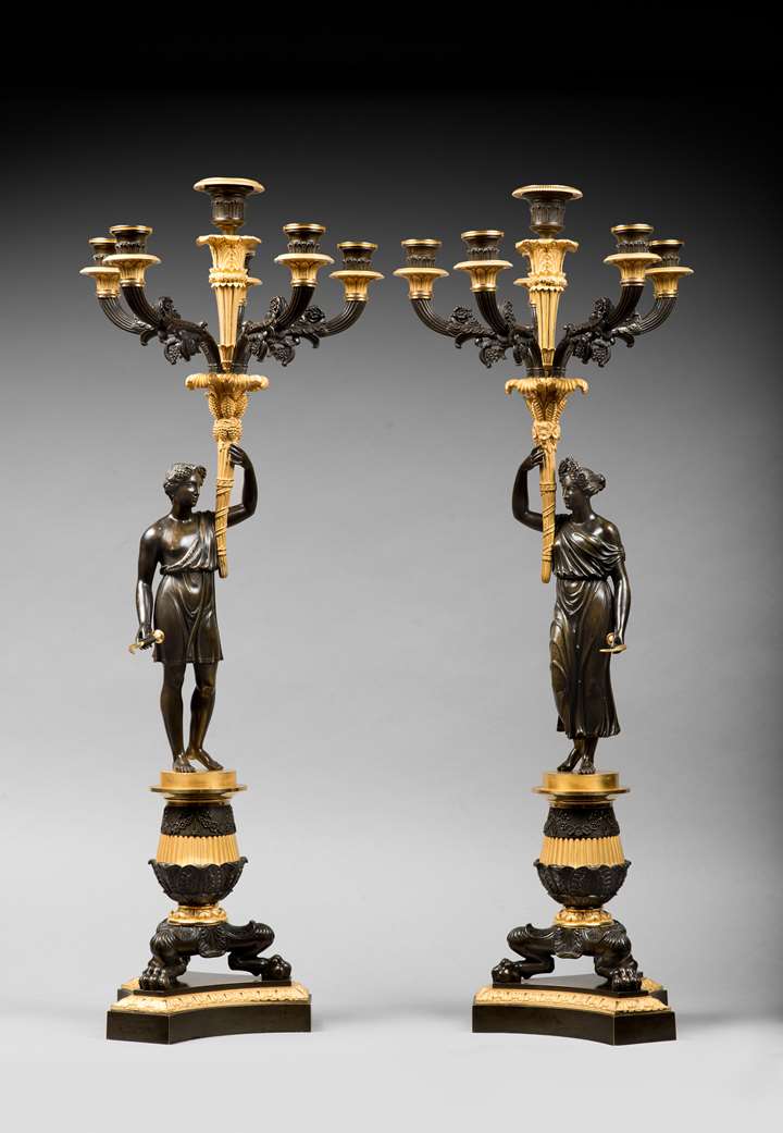 A pair of Empire ormolu and patinated bronze six-light candelabra
